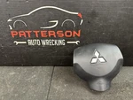 09-10 Mitsubishi Lancer Driver Left Steering Wheel Air Bag Inflator. Fixed Price $125.00.